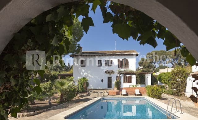 Villa with a unique construction style in Rocafort for sale.