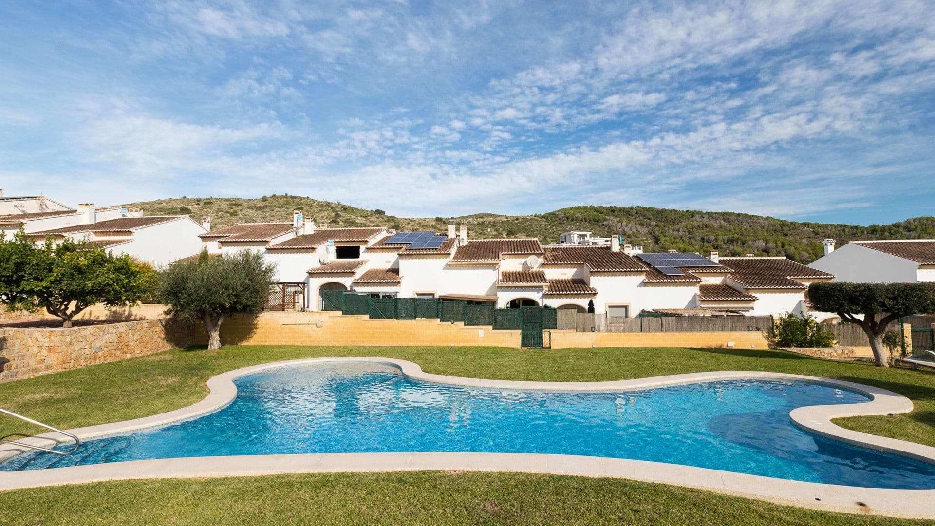 Adosado con piscina comunitaria en Racó del Nadal, Benitachell